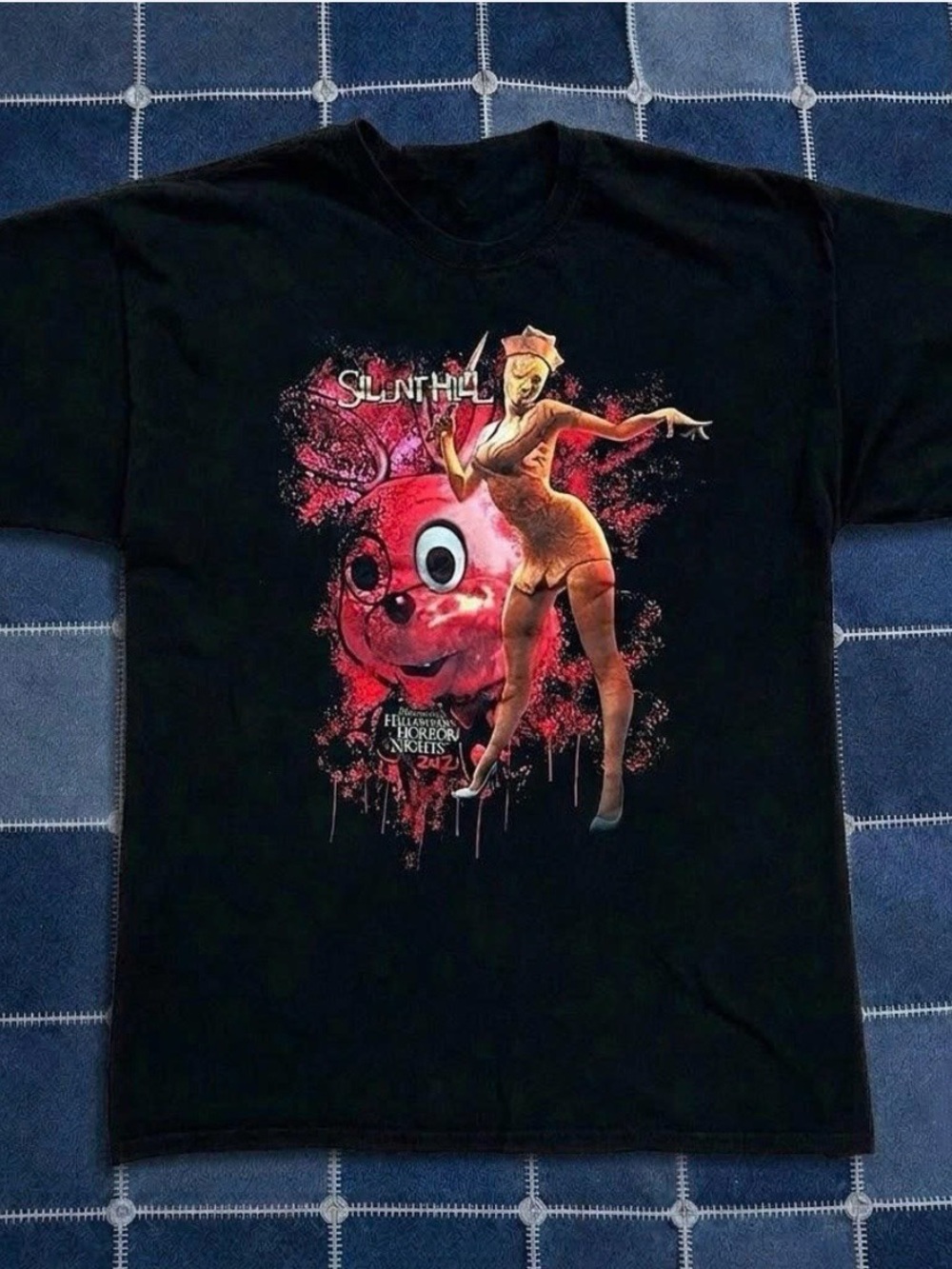 Black Short-Sleeve Graphic Tee with Red and Yellow Horror Art